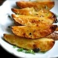 Roasted potatoes with lemon juice olive oil and oregano